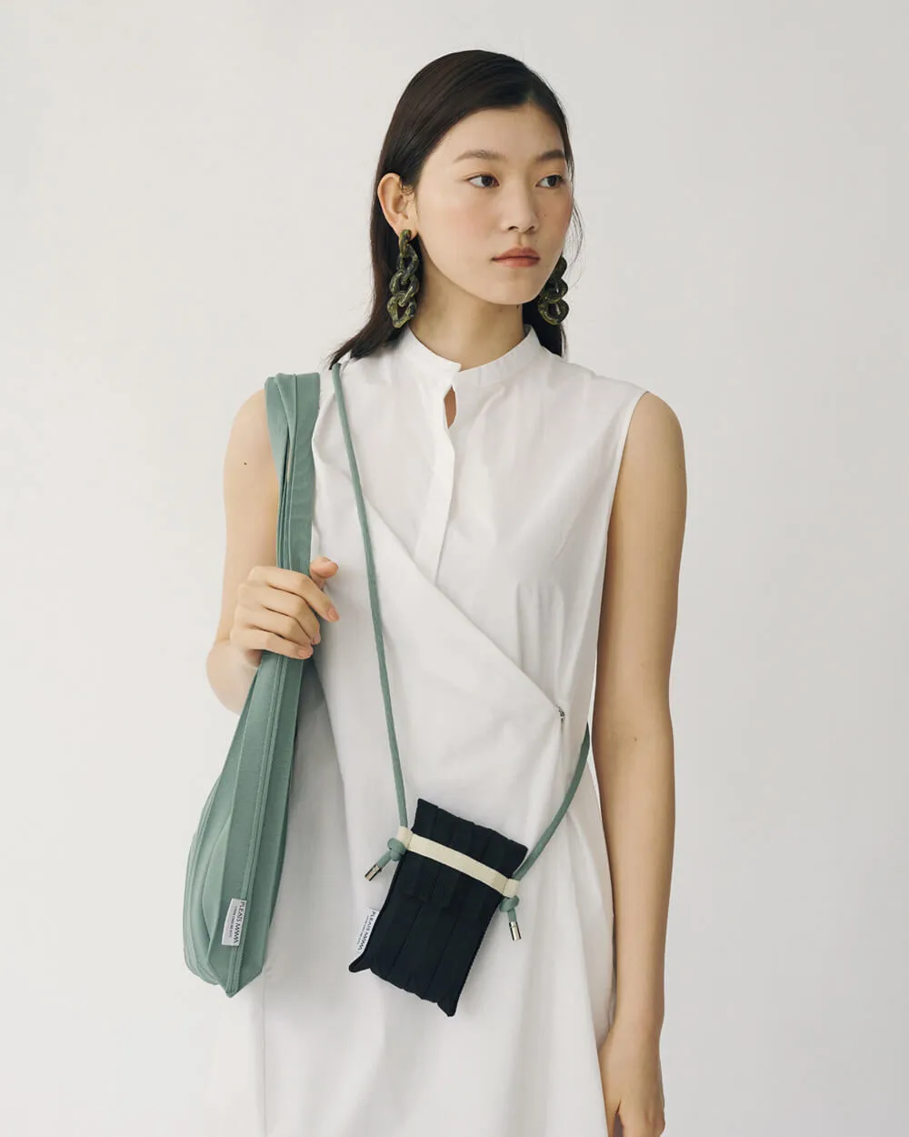 Knit Pleated Phone Bag made from Recycled Ocean Plastic - Flamingo